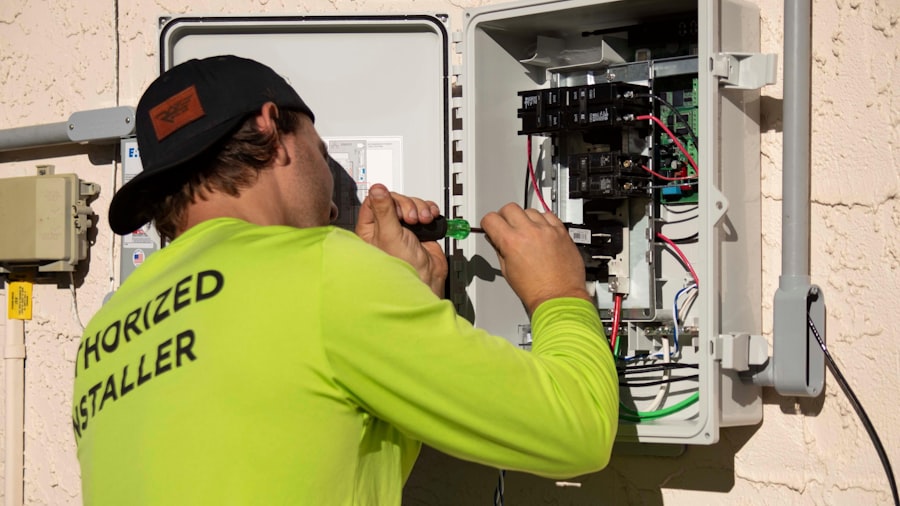 Authorized installer wiring an alarm control panel